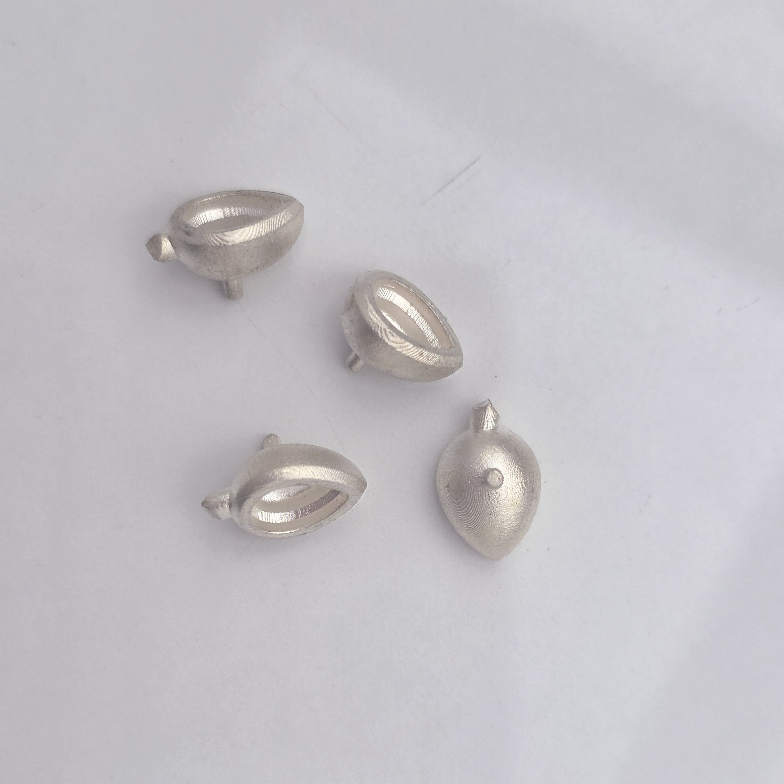 Pear Shape Pebble Setting 7x5mm