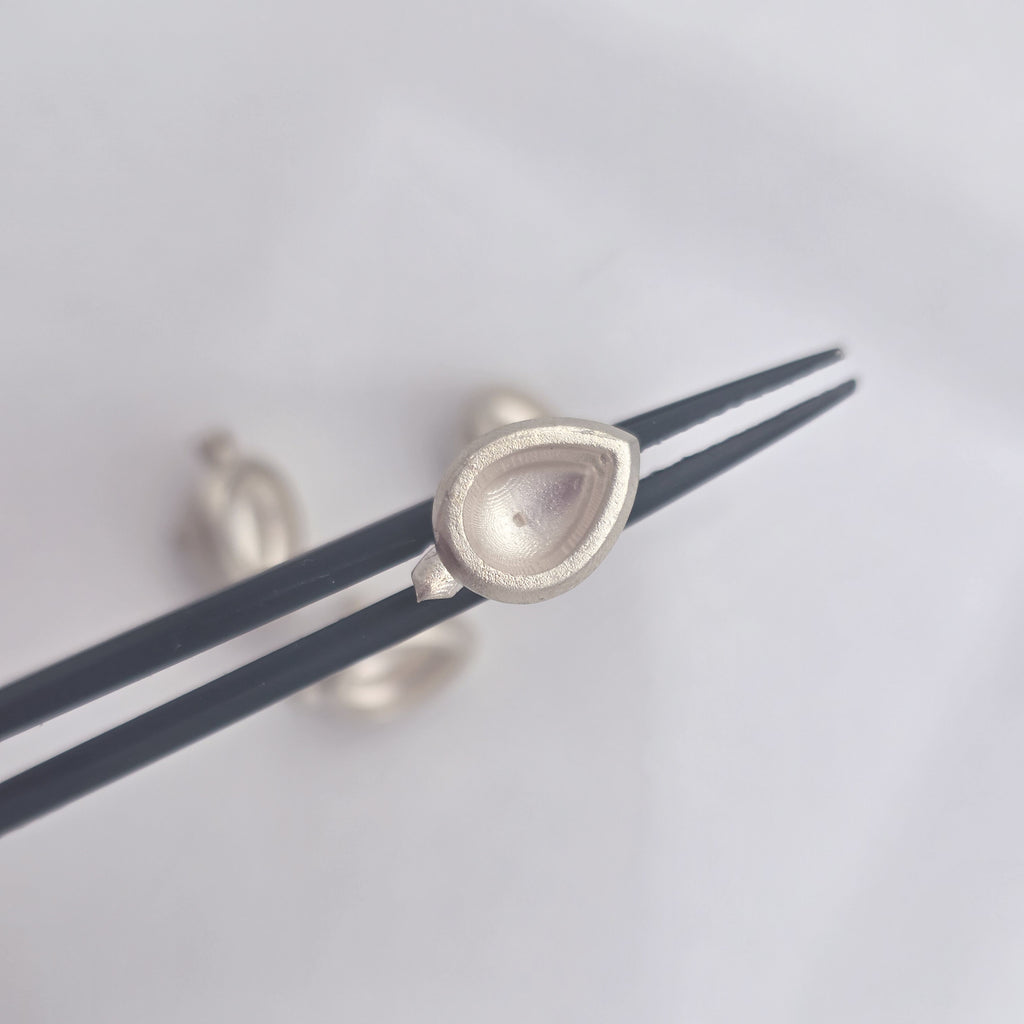 Pear Shape Pebble Setting 7x5mm