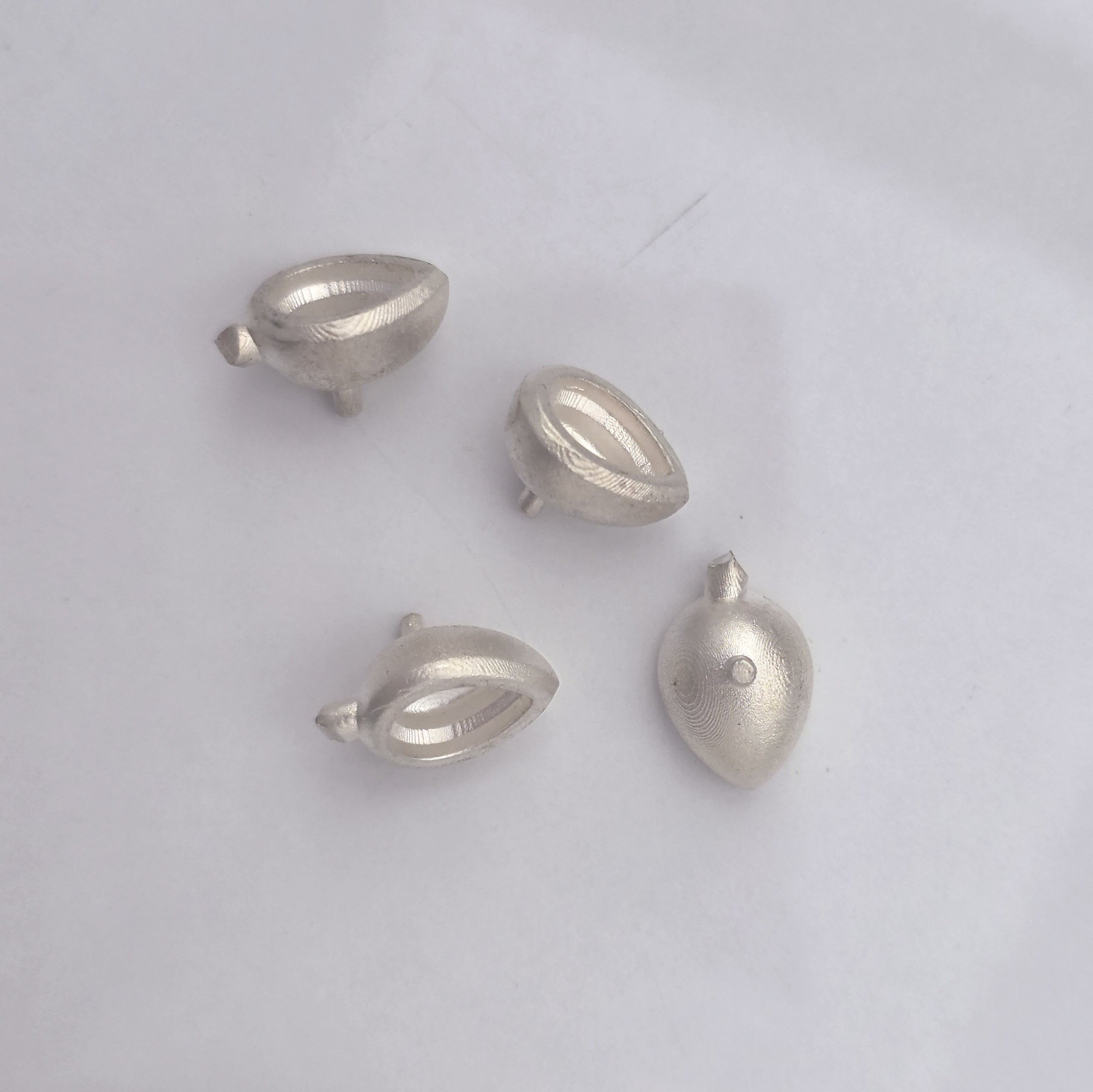 Pear Shape Pebble Setting 7x5mm